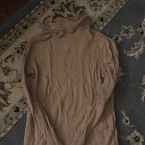 Tan turtleneck sweater